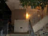 Stairs going up to the bathroom.