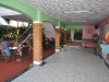 Roofed section, below the room for rent and staircase